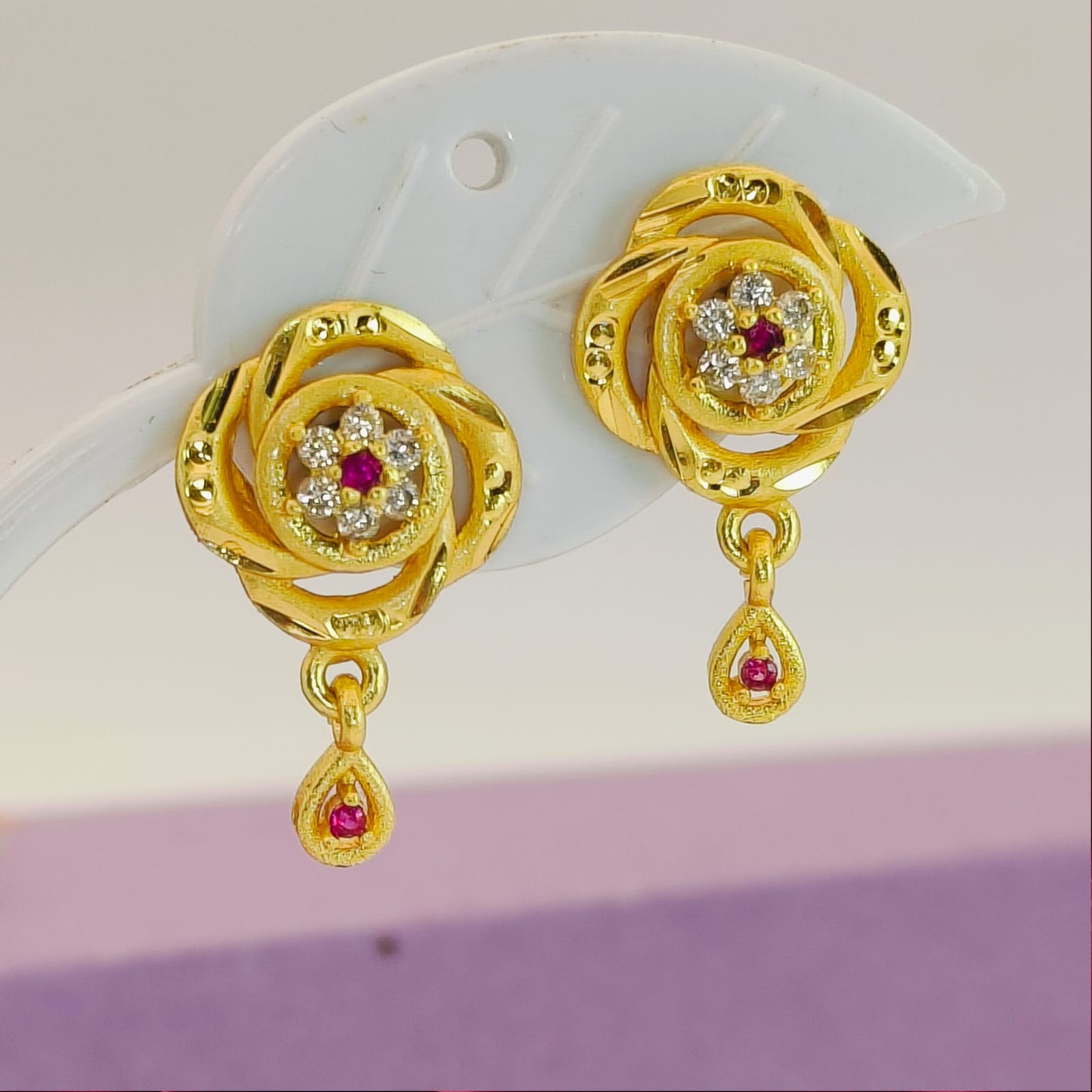 Ornate Intertwined Ribbon Ruby Drop Earrings