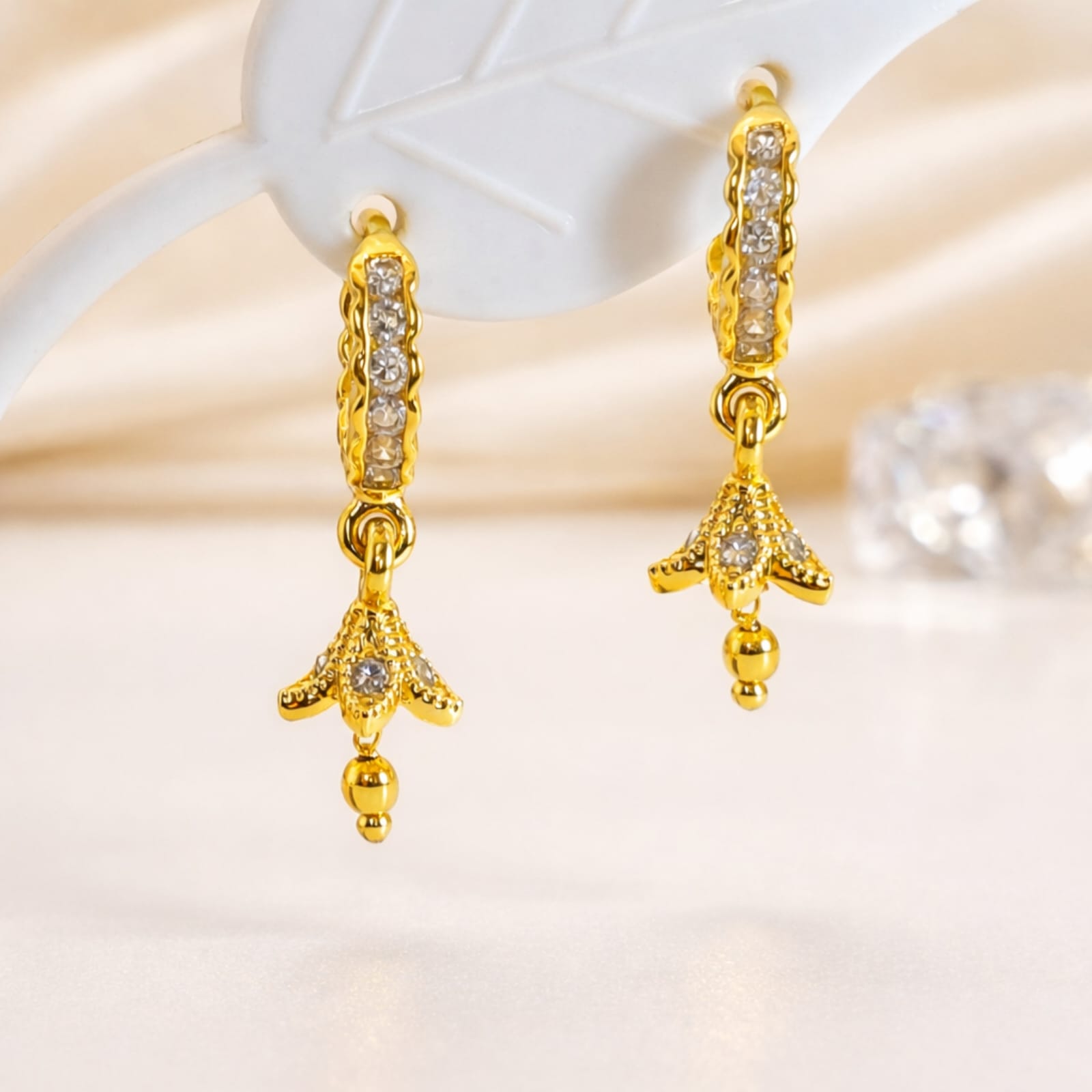 Radiant Crystal-Accented Gold Floral Drop Earrings
